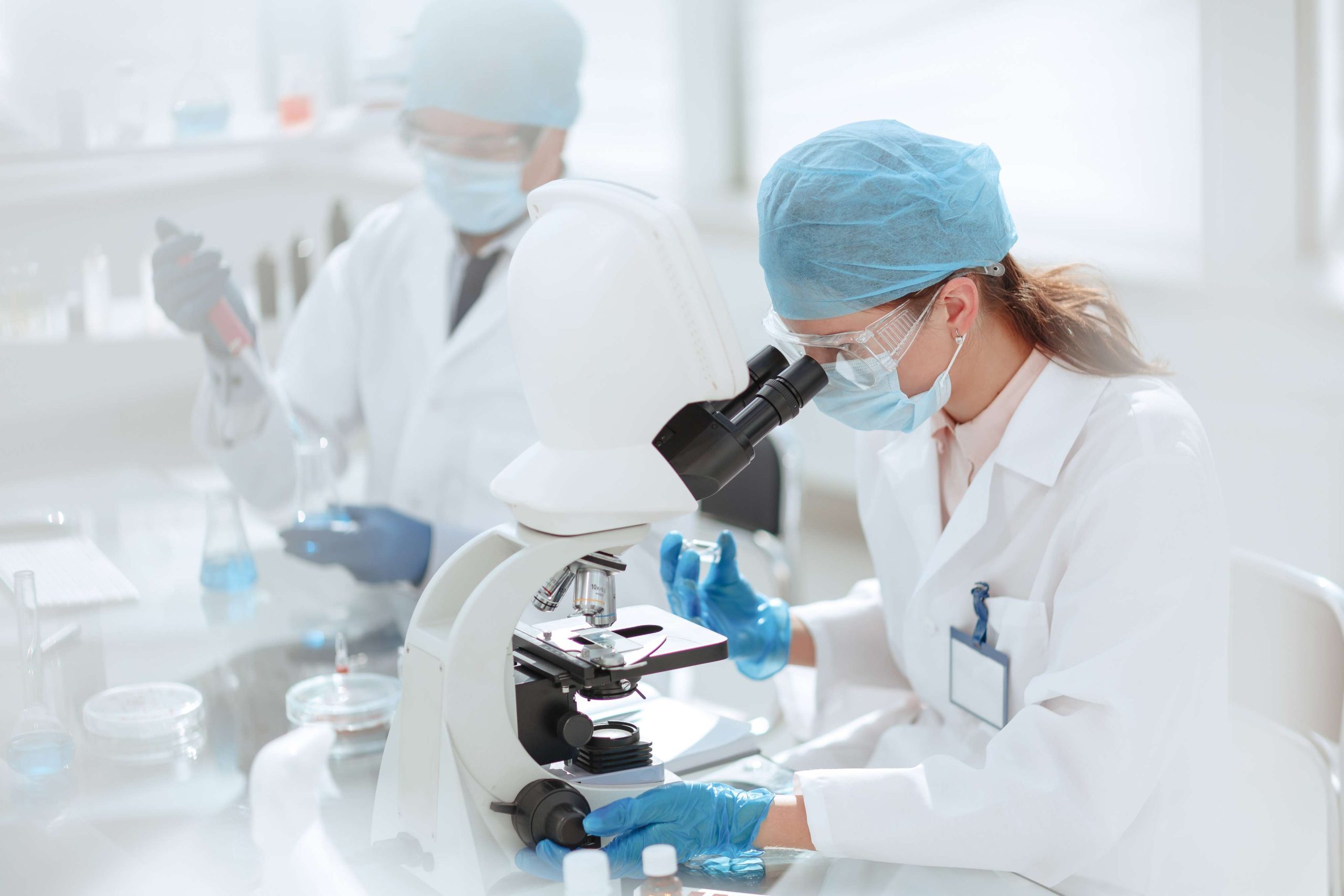 laboratory technician conducts testing in the laboratory .