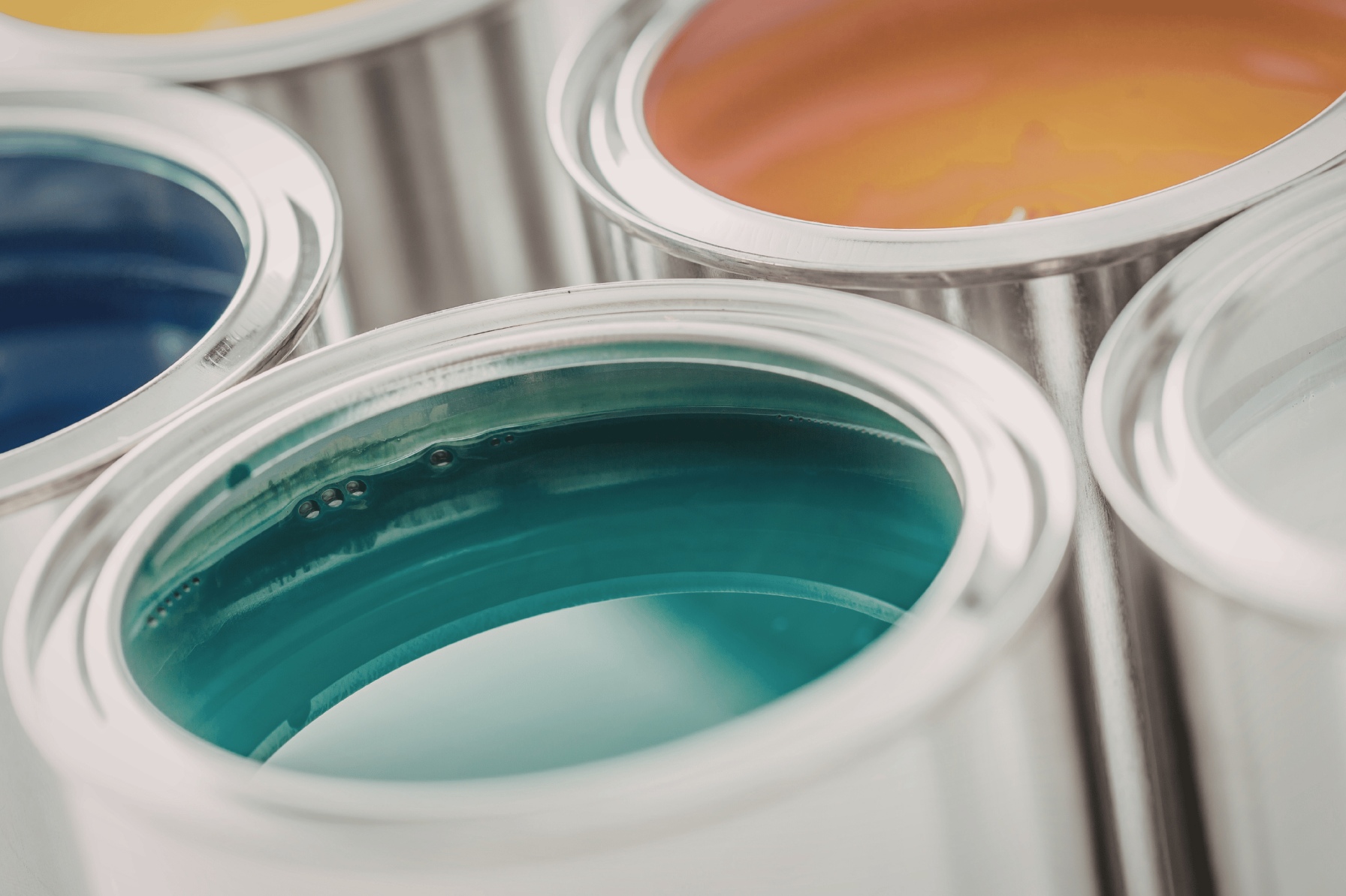 pots of blue, green and orange paint.