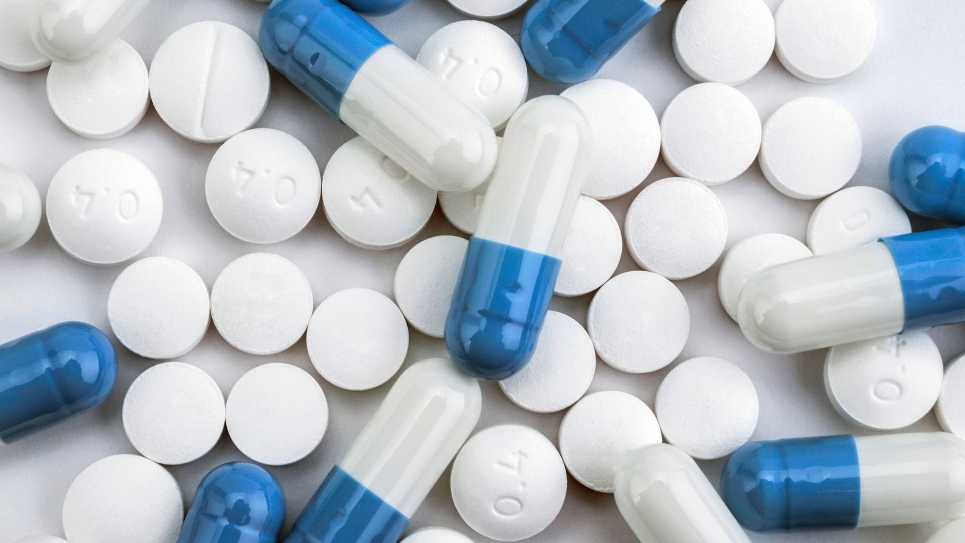 a lot of pills on a counter with Microcrystalline Cellulose