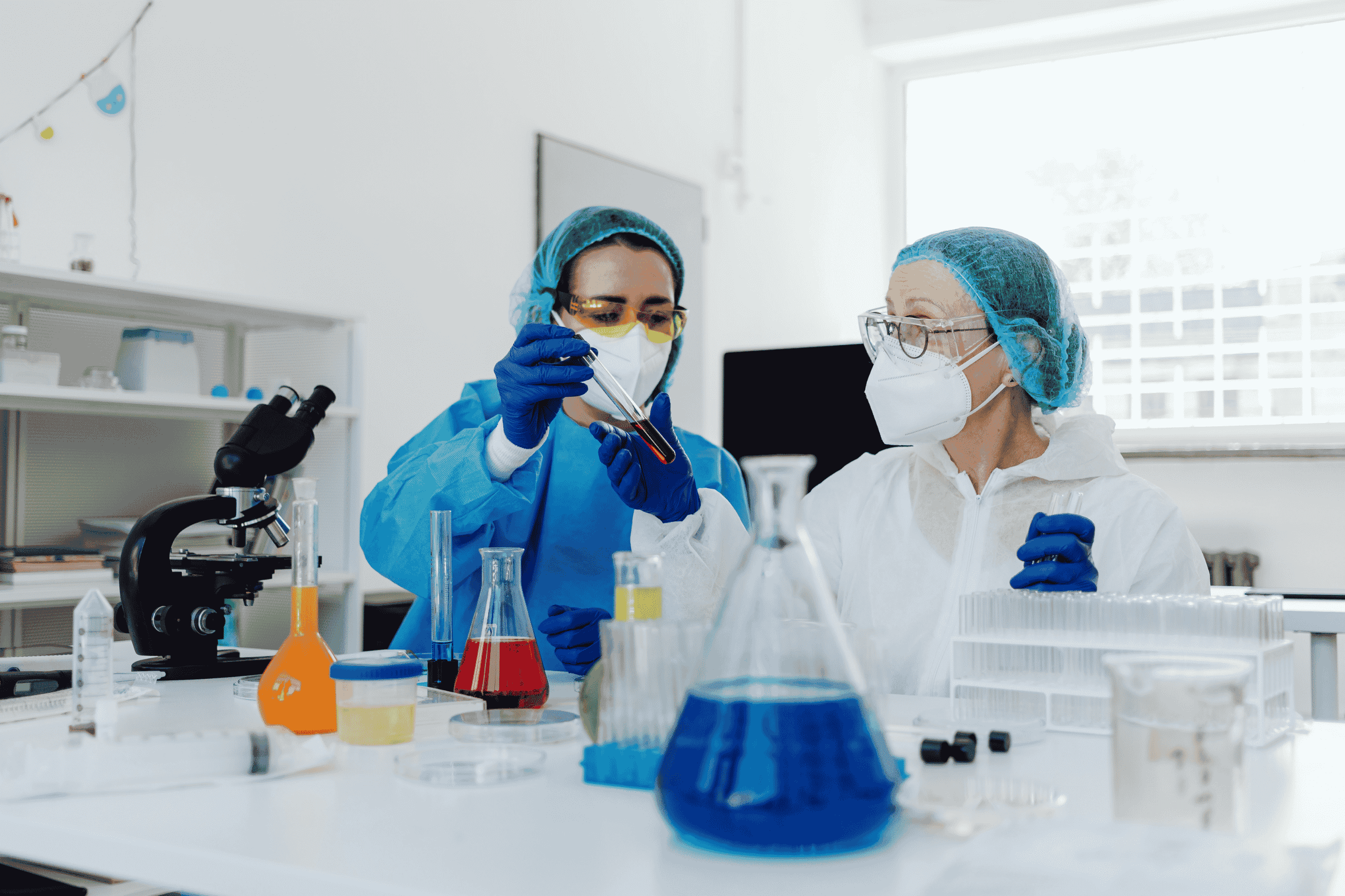 two lab people working in preparation for reach 2026