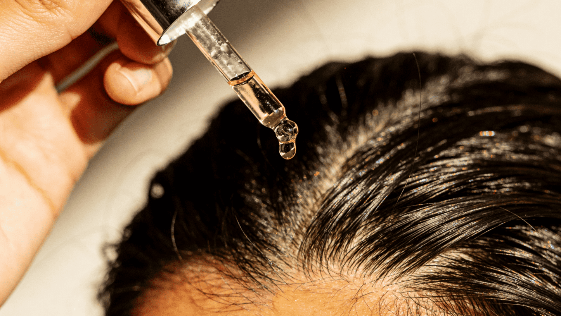 drop of serum on hair for j beauty