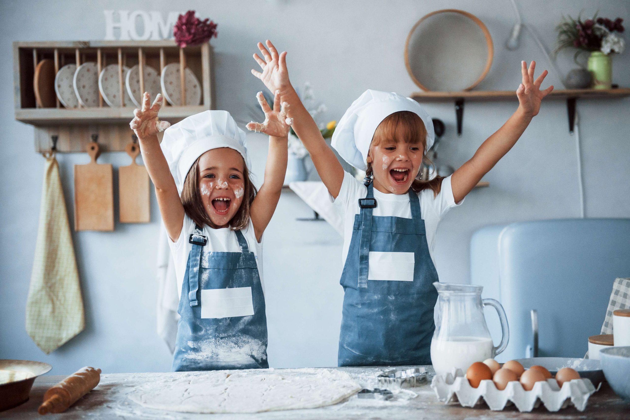 Kids cooking in the kitchen.